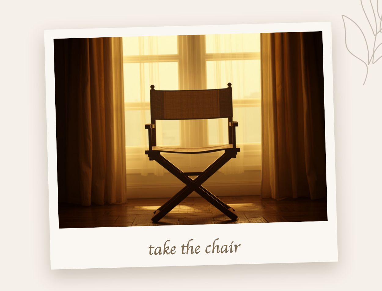 A director's chair in warm window light — the seat is already yours